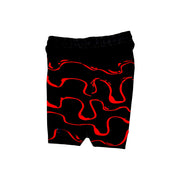 Black shorts with red wavy drip patterns on a white background