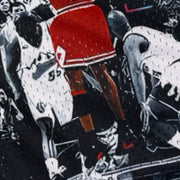 Shorts with a black and white vintage game winner photo design featuring a basketball player in action close up texture.