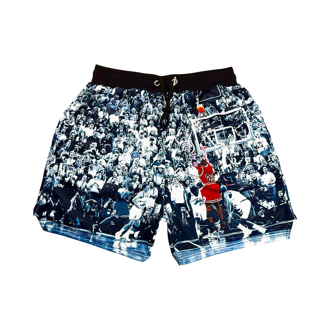 Black white and red shorts with a basketball player taking a historic game winning shot