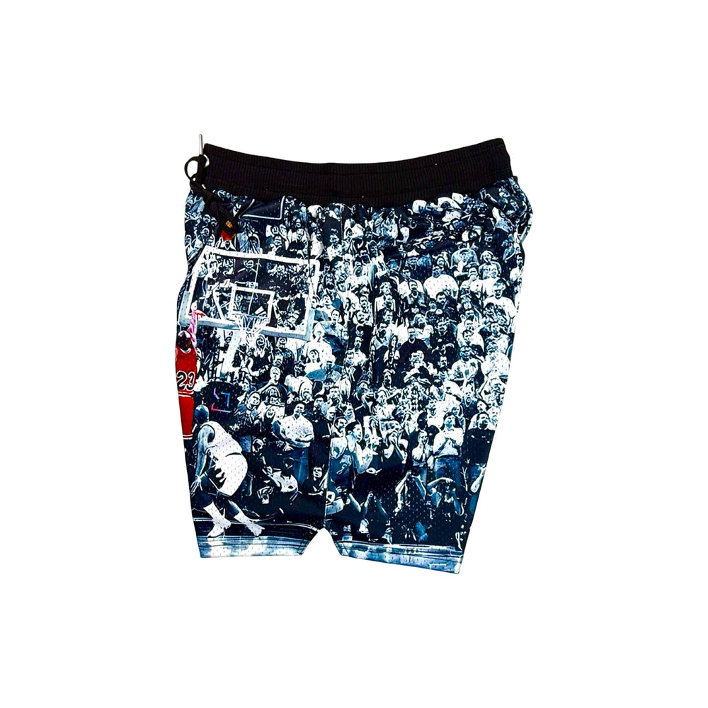 Black white and red shorts with a basketball player taking a historic game winning shot