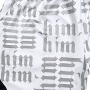 White silver and black him shorts with silver text pattern and black trim closeup