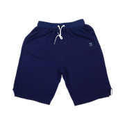 TRAPN™ Navy OFF COURT™ 390 GSM heavyweight Loopback Terry™ joggers with relaxed below-the-knee fit, white drawcord and minimal TRAPN branding.