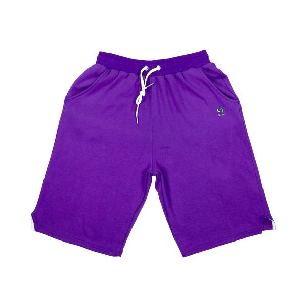 TRAPN™ Purple OFF COURT™ 390 GSM Loopback Terry™ joggers with relaxed below-the-knee fit, deep side pockets and minimal TRAPN™ branding.