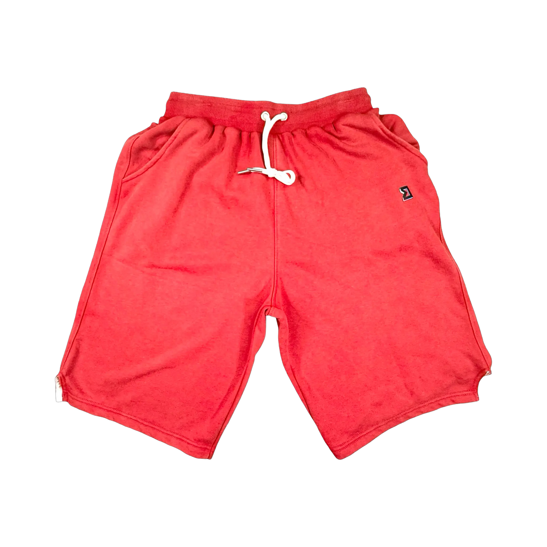 TRAPN™ Red Acid OFF COURT™ 390 GSM heavyweight Loopback Terry™ joggers with washed red finish and relaxed below-the-knee fit.
