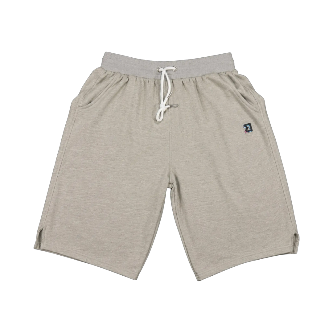 TRAPN™ Tan OFF COURT™ 390 GSM heavyweight Loopback Terry™ joggers with relaxed below-the-knee fit and minimal TRAPN branding.