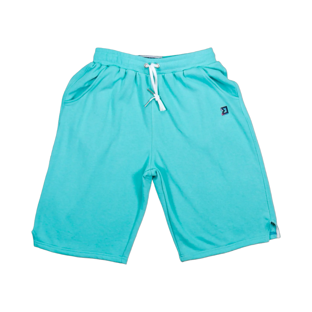 TRAPN™ Teal OFF COURT™ 390 GSM Loopback Terry™ joggers with relaxed below-the-knee fit, deep side pockets and minimal TRAPN™ branding.