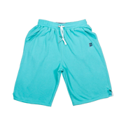 TRAPN™ Teal OFF COURT™ 390 GSM Loopback Terry™ joggers with relaxed below-the-knee fit, deep side pockets and minimal TRAPN™ branding.