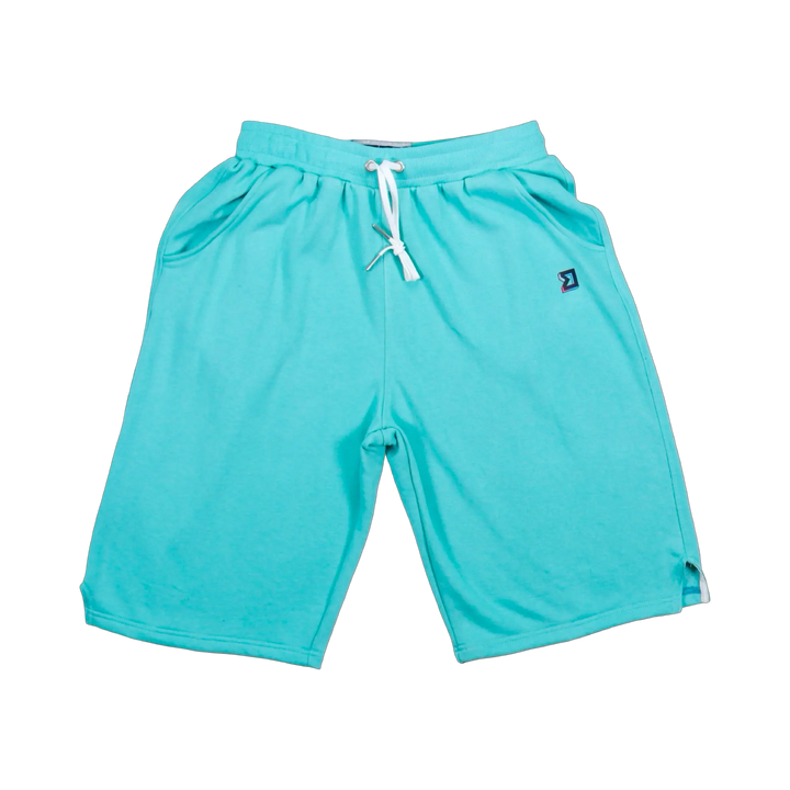 TRAPN™ Teal OFF COURT™ 390 GSM Loopback Terry™ joggers with relaxed below-the-knee fit, deep side pockets and minimal TRAPN™ branding.