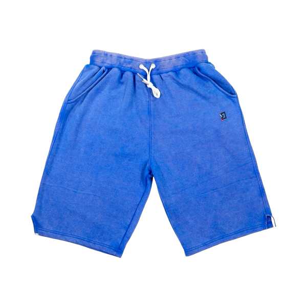TRAPN™ Blue Acid OFF COURT™ 390 GSM Loopback Terry™ joggers with washed blue finish, relaxed below-the-knee fit and TRAPN™ logo.