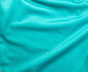 Turquoise mesh shorts with gold stripes on a white background