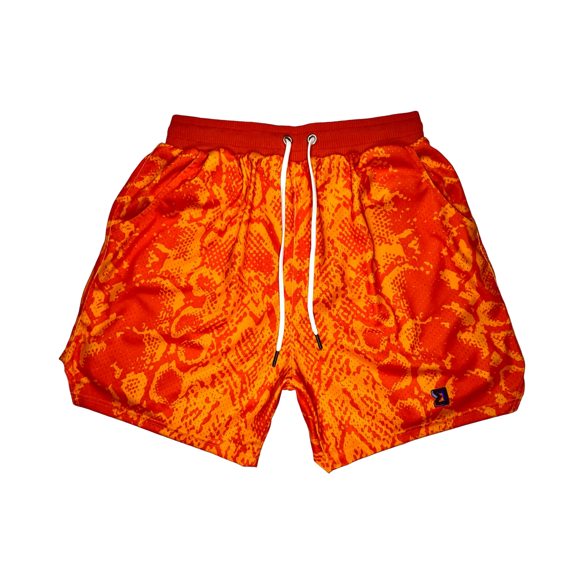 Mamba Elite PRO™ orange basketball shorts featuring a bold snakeskin-inspired pattern, premium MeshX™ construction, oversized PRO waistband, and performance athletic fit designed to match Kobe and Jordan sneakers.