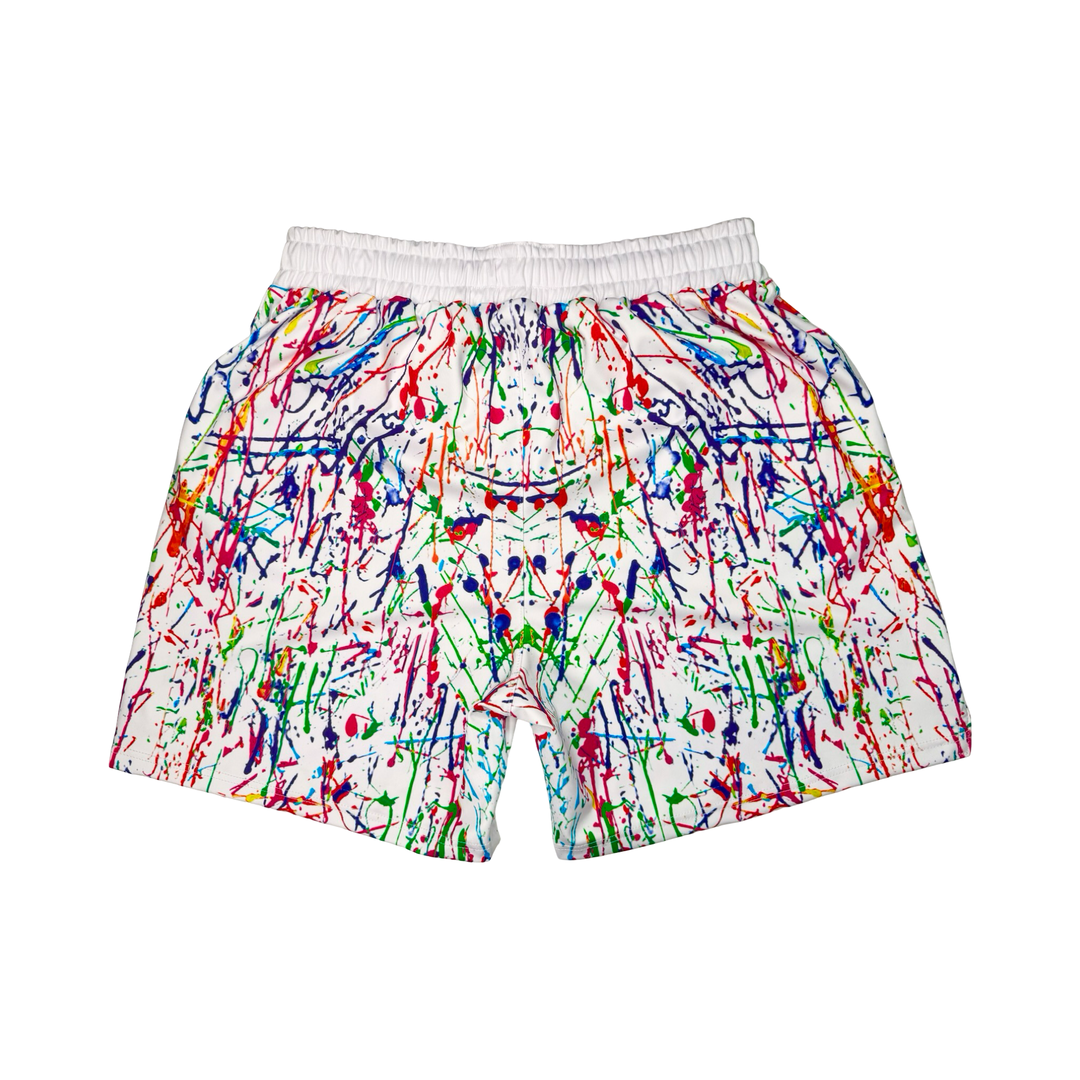 Colorful splatter paint shorts on a white background