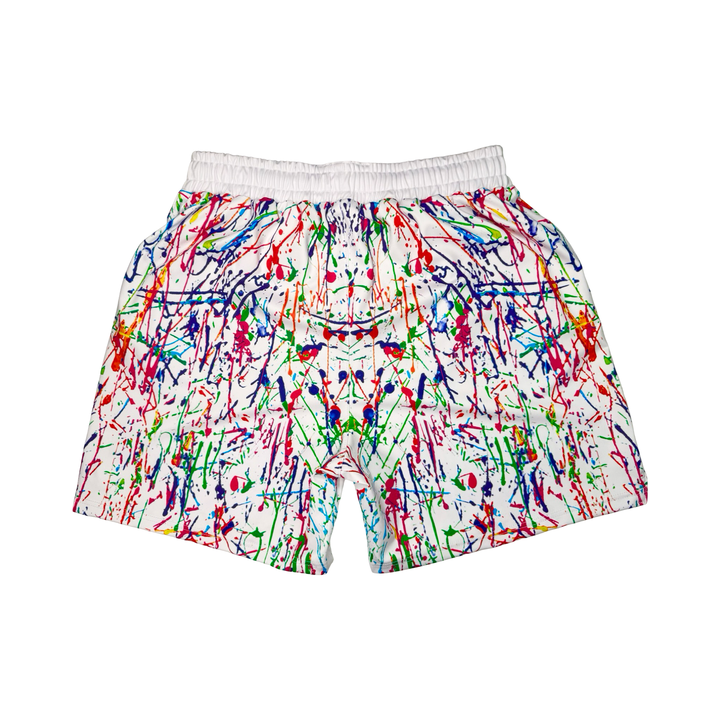 Colorful splatter paint shorts on a white background