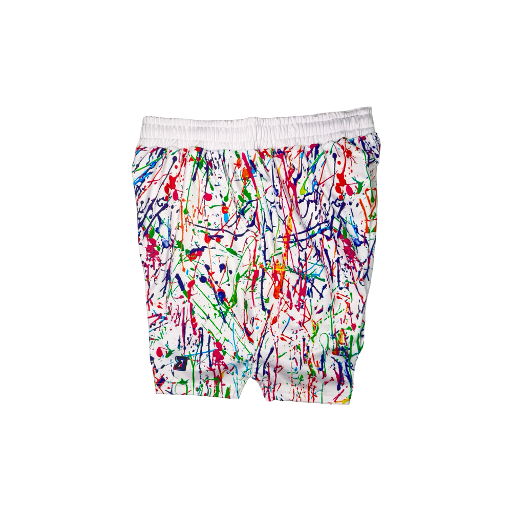 Colorful splatter-patterned shorts on a white background