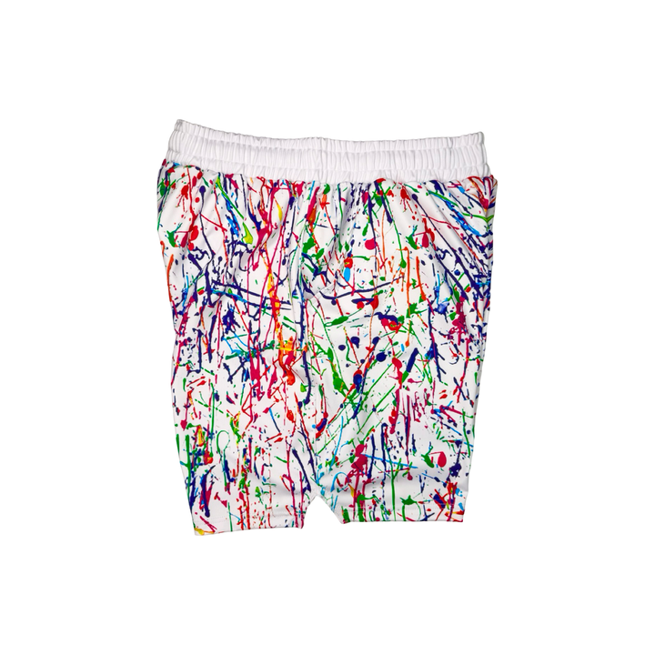 Colorful splatter-patterned shorts on a white background