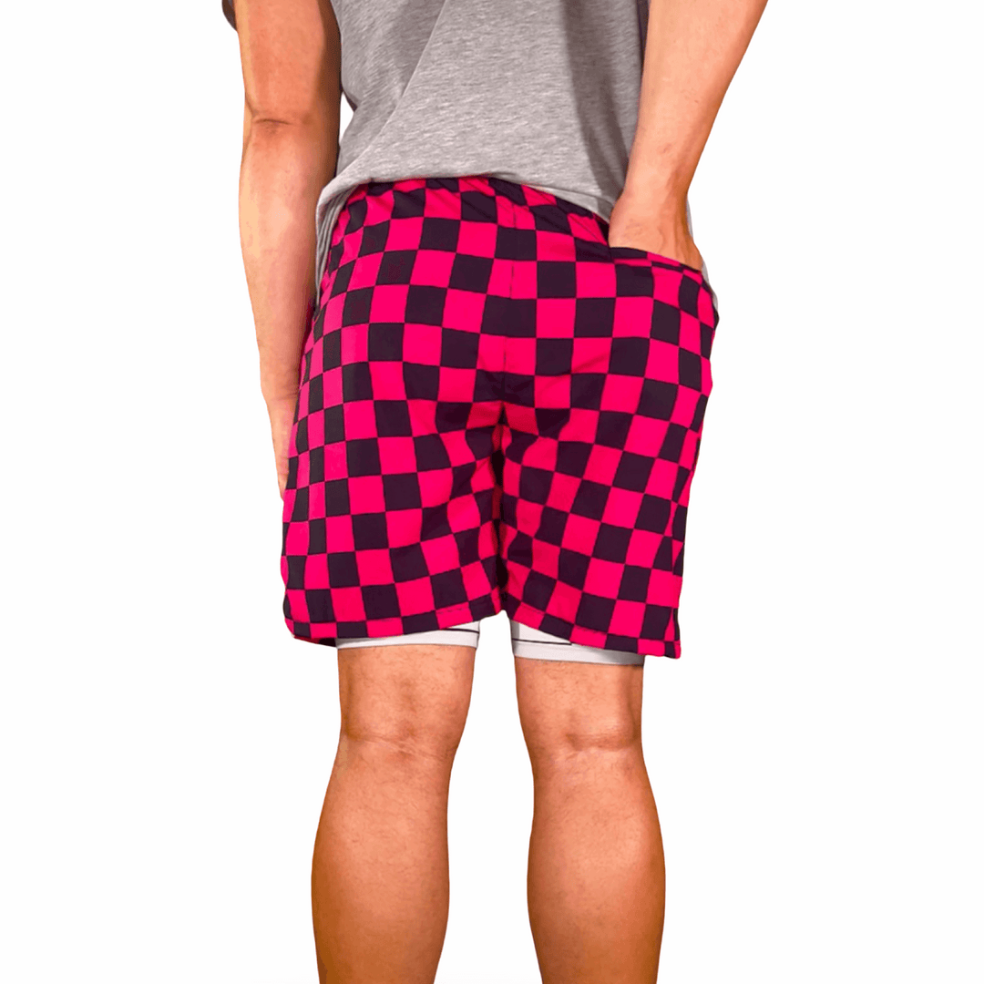 CHECKMATE GO | PINK Water Resistant 4-Way Stretch Dry-Fit Trunks Trap'n Shorts