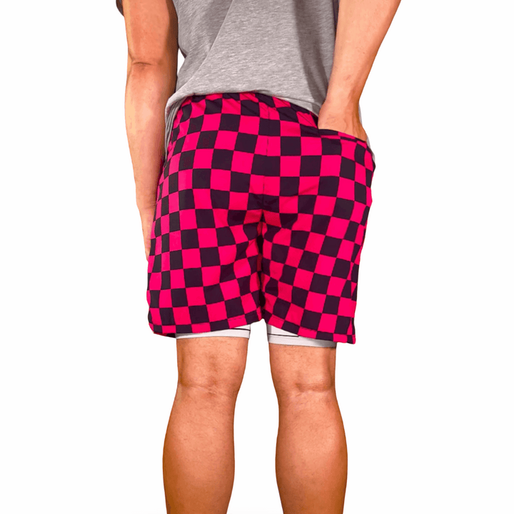 CHECKMATE GO | PINK Water Resistant 4-Way Stretch Dry-Fit Trunks Trap'n Shorts