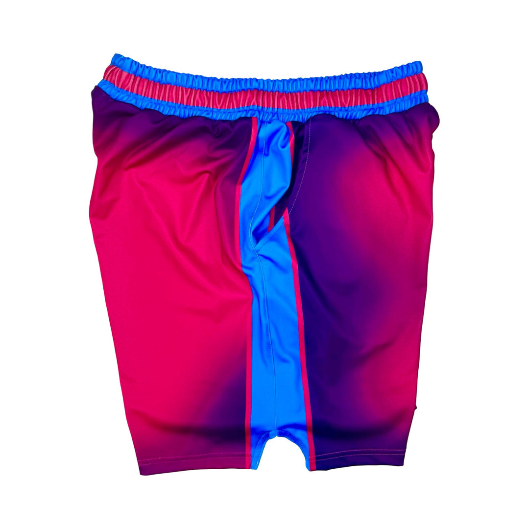 Pink and blue shorts with a gradient effect on a white background