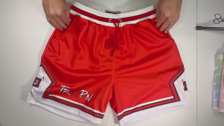 Premium Trap Goat Mesh Pro shorts with zippered back pockets, pro waistband, and bold above-the-knee fit by TRAPN Shorts