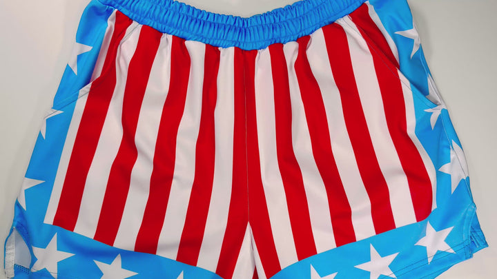 Apollo Sky Soft Quick-Dry basketball shorts with red-white stripes and blue star borders inspired by vintage patriotic sports aesthetics by Trap’N Shorts.