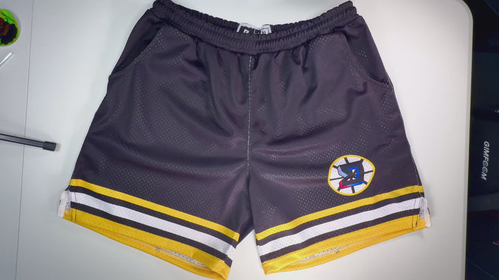 Gilmore Mesh Basketball Shorts – black and gold sports-inspired design by Trap’N Shorts