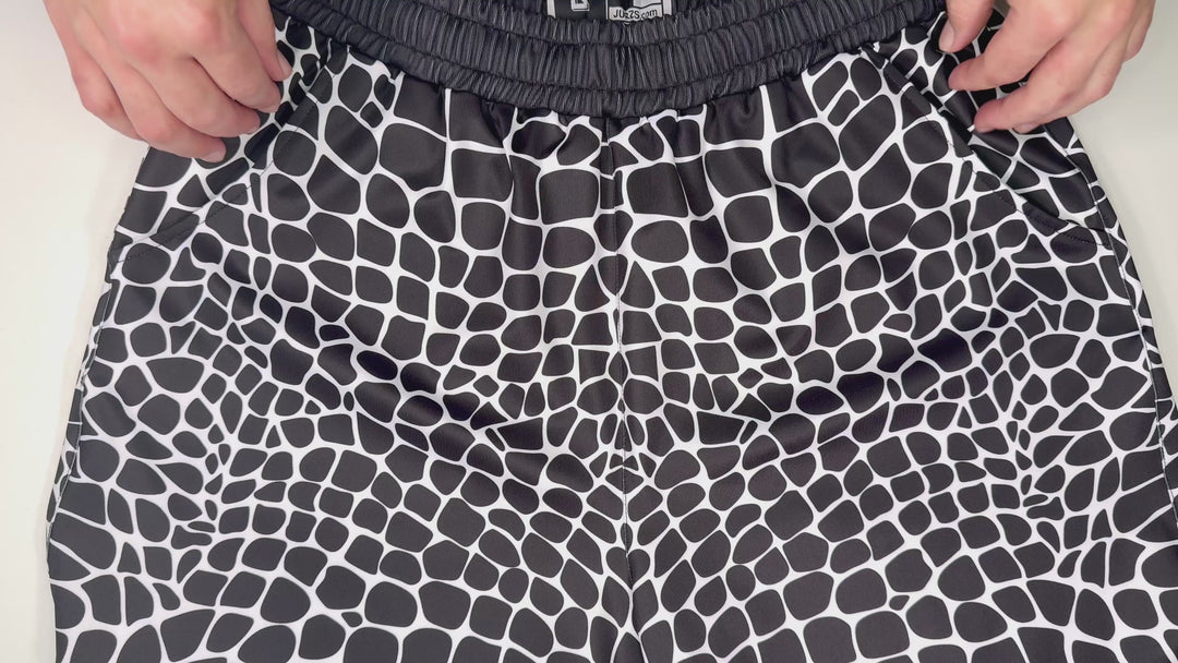 Viper Soft Quick-Dry shorts with dark reptile-scale pattern, lightweight feel, and above-knee fit. Made to Order performance shorts by Trap’N Shorts.