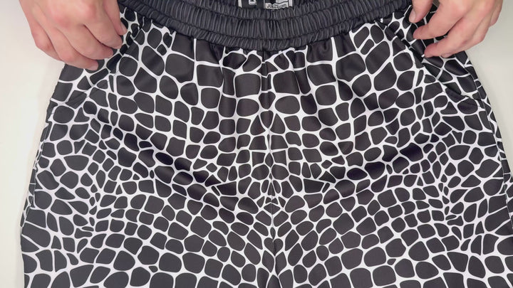 Viper Soft Quick-Dry shorts with dark reptile-scale pattern, lightweight feel, and above-knee fit. Made to Order performance shorts by Trap’N Shorts.
