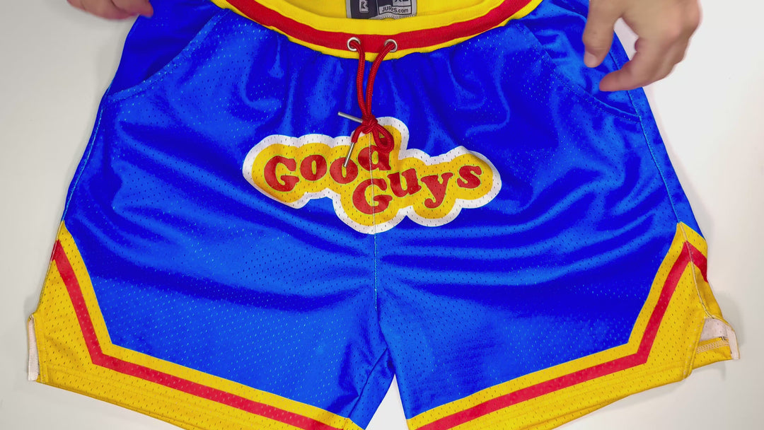 Good Guys Mesh Pro basketball shorts in blue, yellow, and red with bold retro logo and pro-style waistband by Trap’N Shorts.
