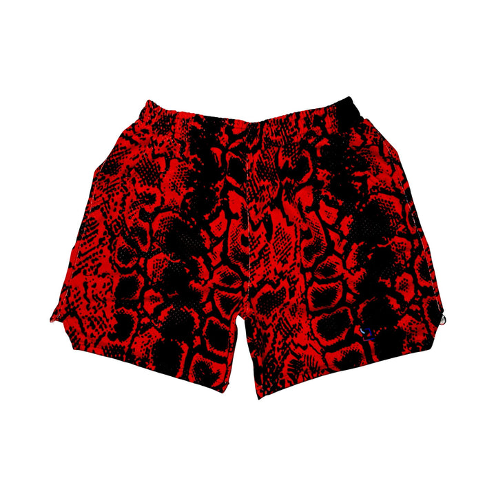 Red and black snakeskin patterned mesh shorts on a white background