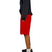 Person wearing a black hoodie and red shorts with black speckle pattern