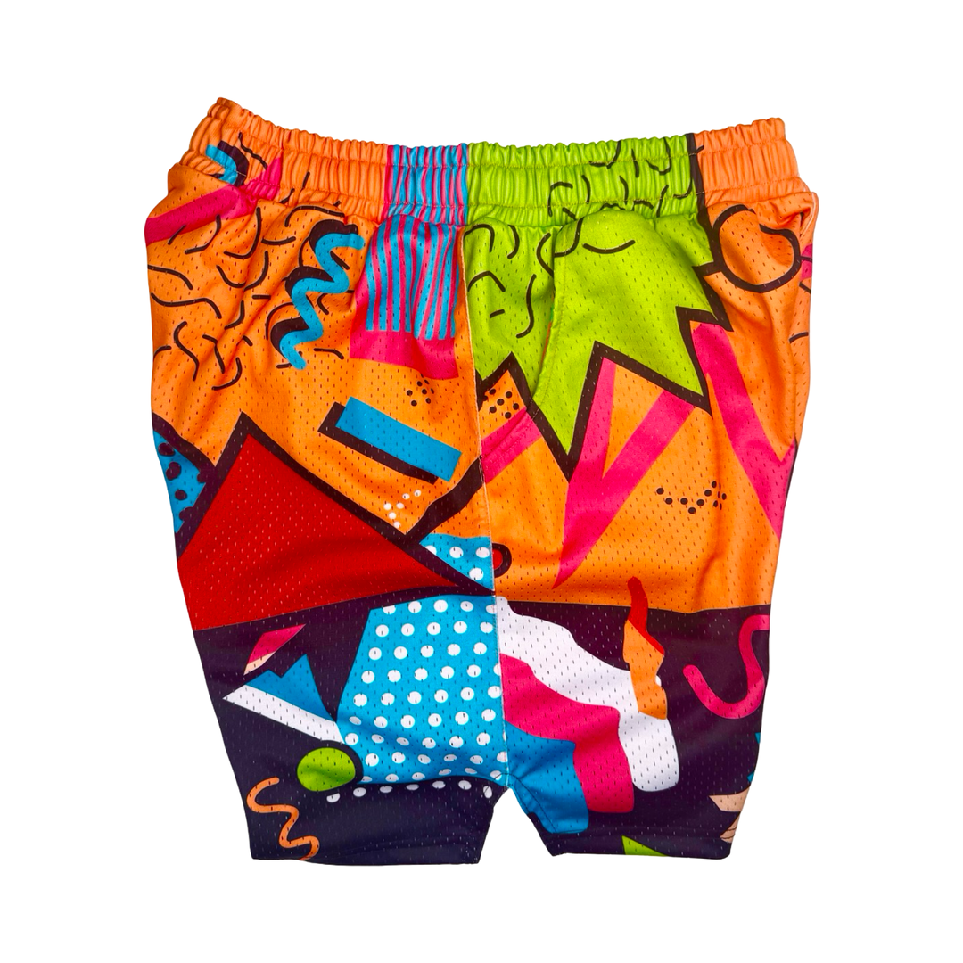 Colorful shorts with abstract geometric pattern on a white background