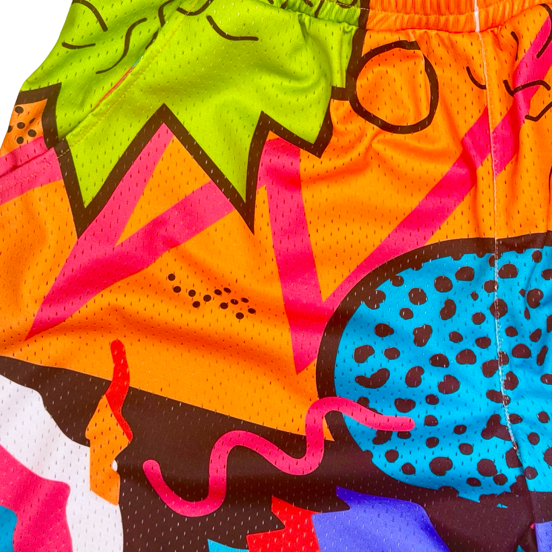 Colorful shorts with abstract patterns on a white background