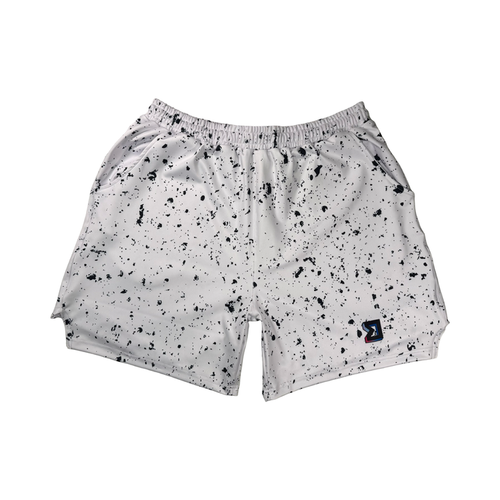 Speckle Soft QD basketball shorts with white/black splatter design. Lightweight, smooth, moisture-wicking  by Trap’N Shorts.