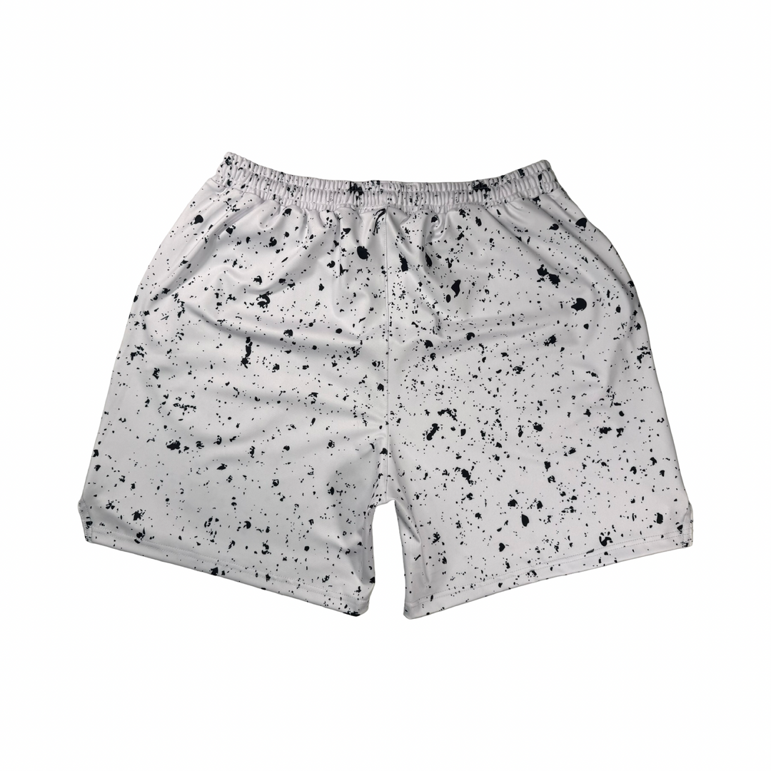 Speckle Soft QD basketball shorts with white/black splatter design. Lightweight, smooth, moisture-wicking  by Trap’N Shorts.