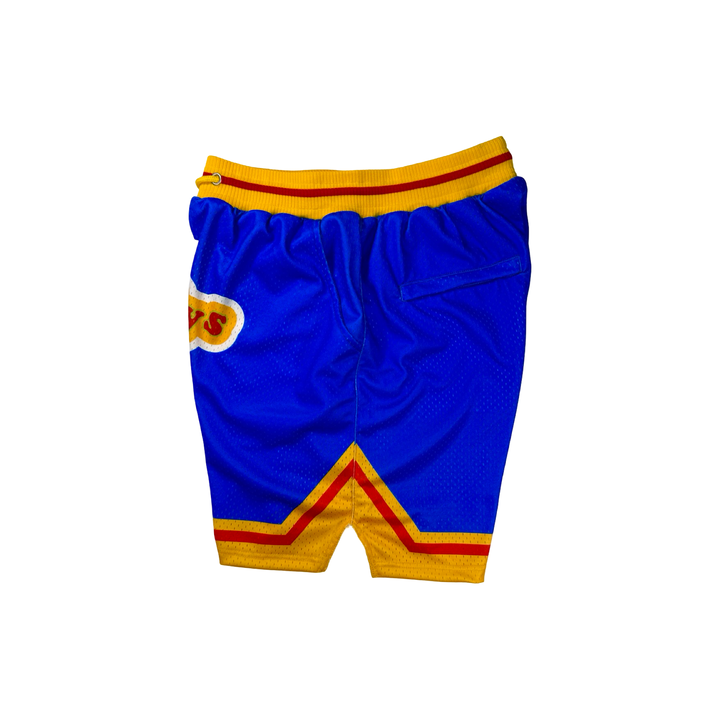 Good Guys Mesh Pro basketball shorts with retro blue–yellow colorway, zippered back pocket, and thick pro waistband by Trap’N Shorts.