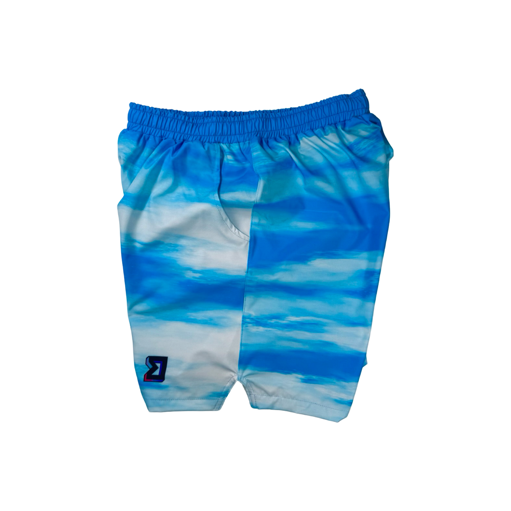 Clouds GO basketball shorts with a blue sky pattern. Lightweight, breathable, water-resistant GO fabric. Above-knee fit by Trap’N Shorts.