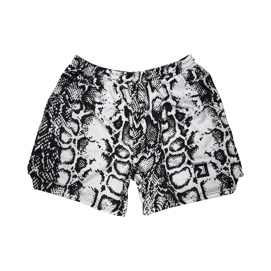 Snake print shorts on a white background