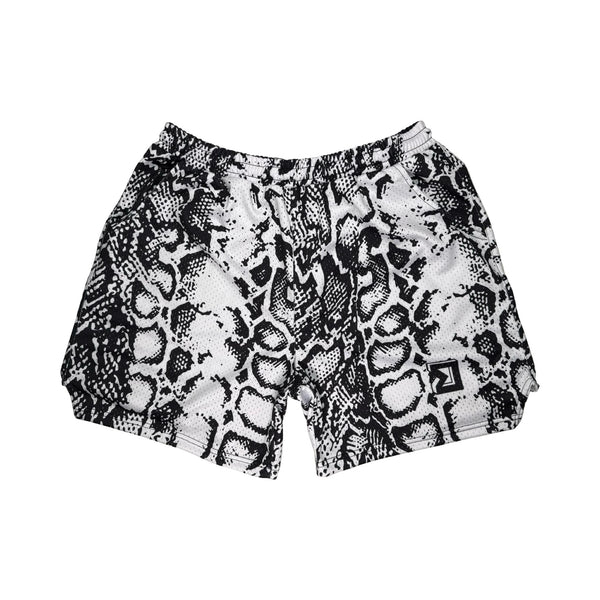 Snake print shorts on a white background