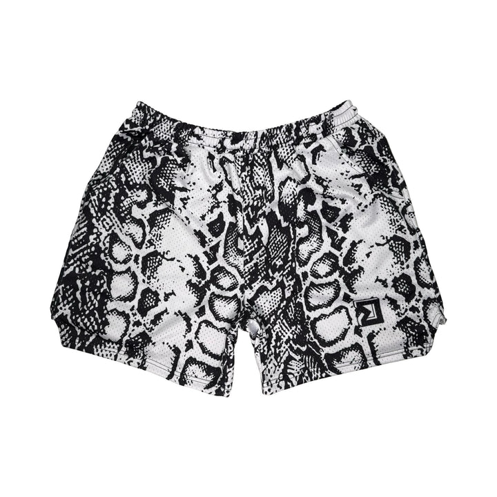 Snake print shorts on a white background
