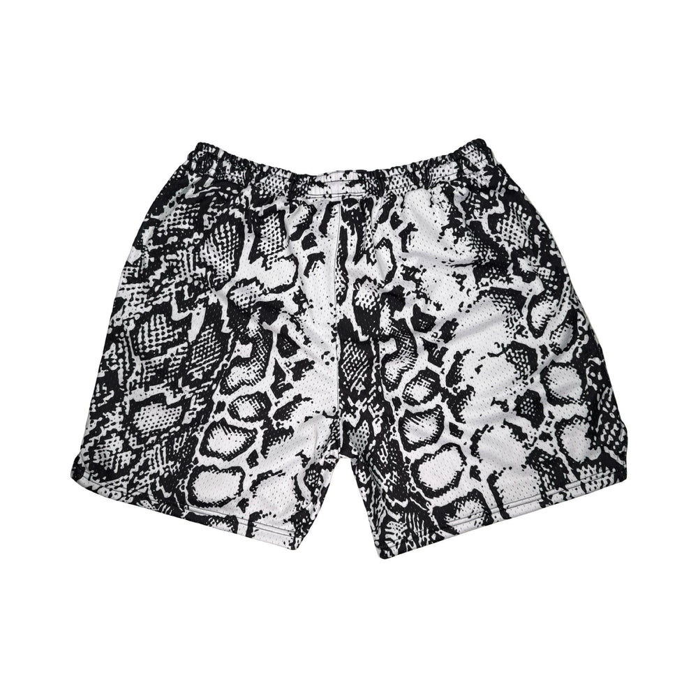 Snake print shorts on a white background