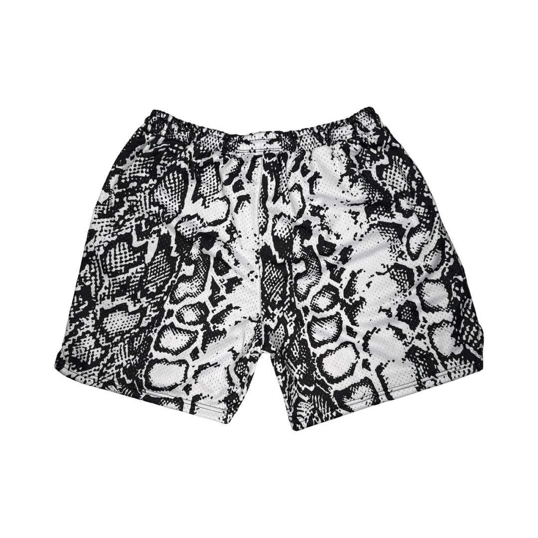 Snake print shorts on a white background