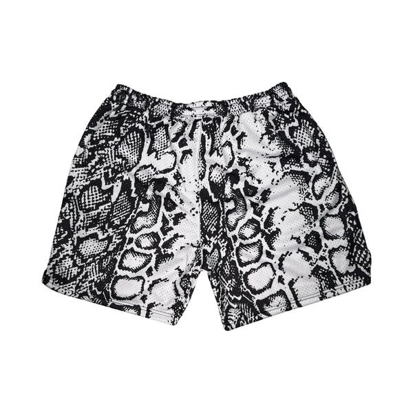 Snake print shorts on a white background