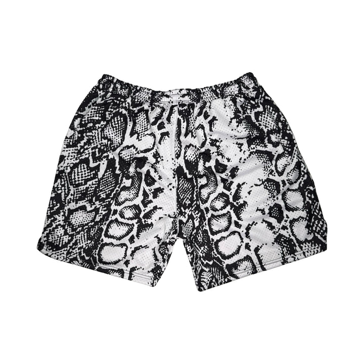 Snake print shorts on a white background