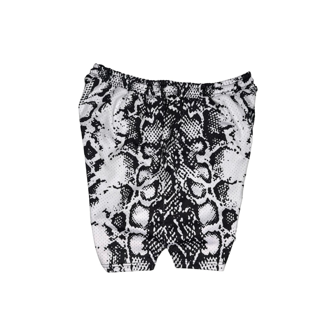 Black and white snake print shorts on a white background