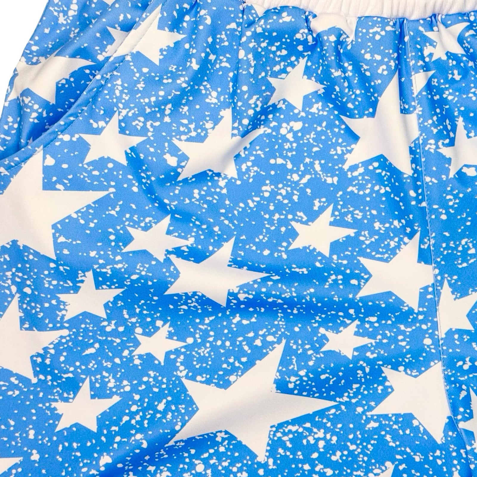 Sky Blue soft dry fit shorts with white star and snow pattern closeup texture
