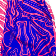 Pair of two-tone shorts with pink and purple swirl pattern texture closeup 
