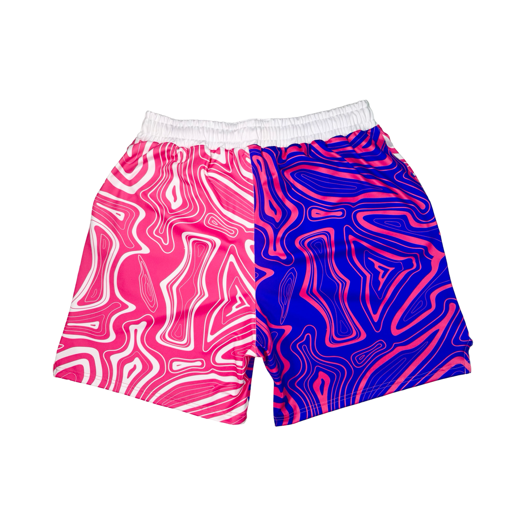 Pair of shorts with pink and blue abstract pattern on a white background