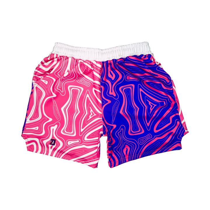 Pair of shorts with pink and blue abstract pattern on a white background
