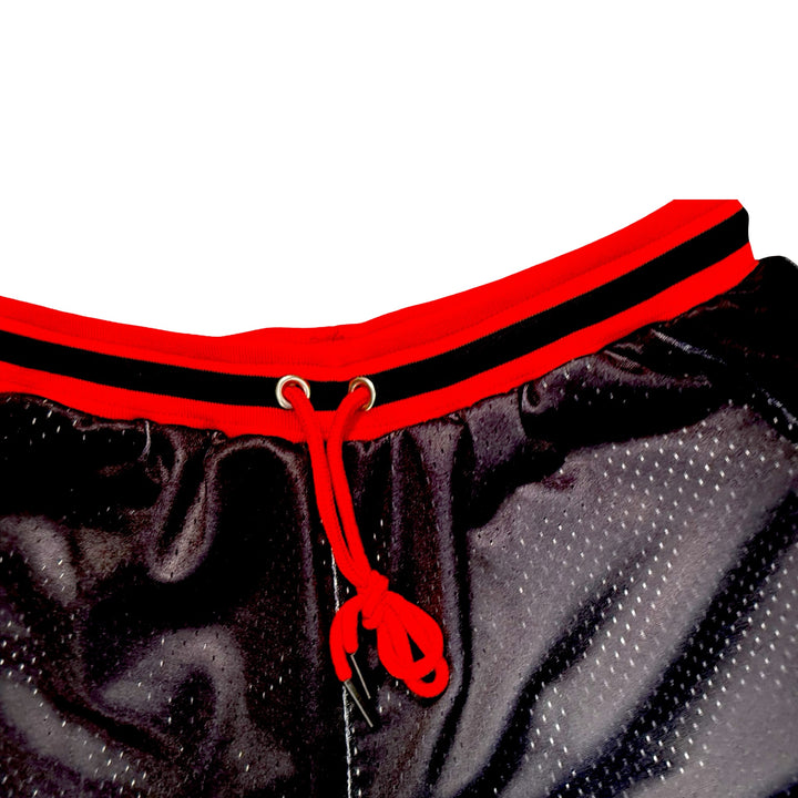 Black and red pro style mesh shorts with logo and 2 inch waistband