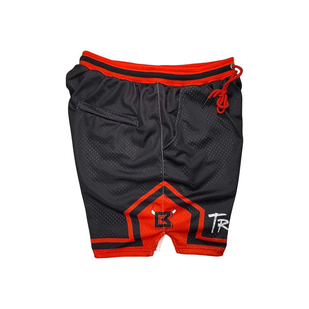 Black and red athletic shorts with a logo on a white background